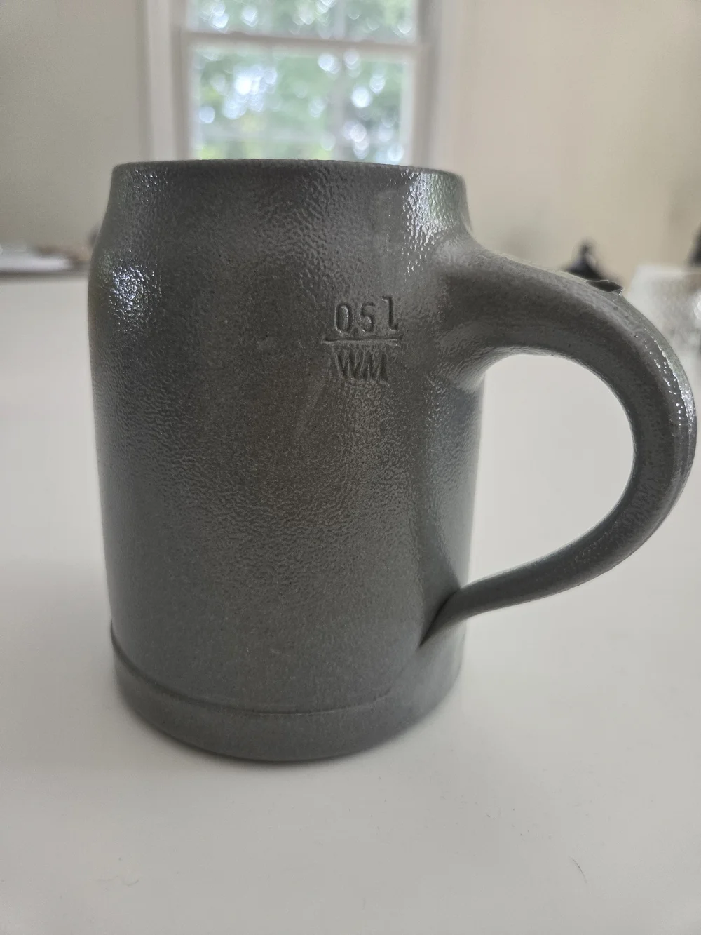 HB Embossed Stoneware Stein in Gray with Blue Accents